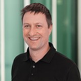 Technischer Gruppenleiter Schalungsbau & Holzbau lächelt in die Kamera