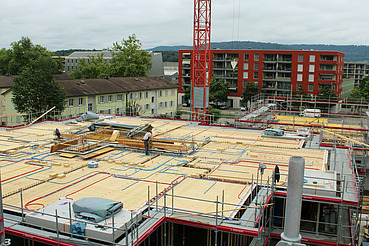 Holzarbeiten am Kesslerplatz - STRABAG Holzbau Foto von Holzbauarbeiten von Oben