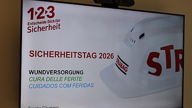 Präsentationsfolie zum STRABAG Sicherheitstag 2026 mit Thema Wundversorgung.