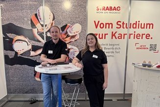 Zwei STRABAG Mitarbeitende an der Karrieremesse der ETH Hönggerberg in Zürich